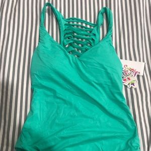 Becca turquoise one piece bathing suit.